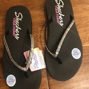 Sketchers black foam sandals w/silver rhinestones.